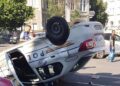 Polițiști în misiune, răsturnați de un șofer grăbit